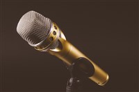 Microphone against a dark background